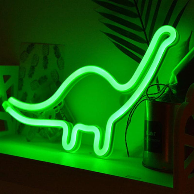 Grön neonlampa i form av dinosaurie