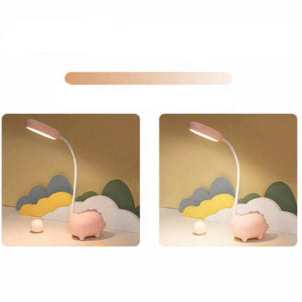 Rosa skrivbordslampa med dinosaurie för barn