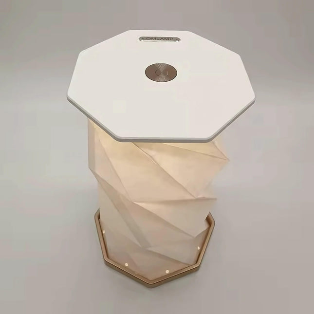 Vikbar LED-lampa med modern origami-design