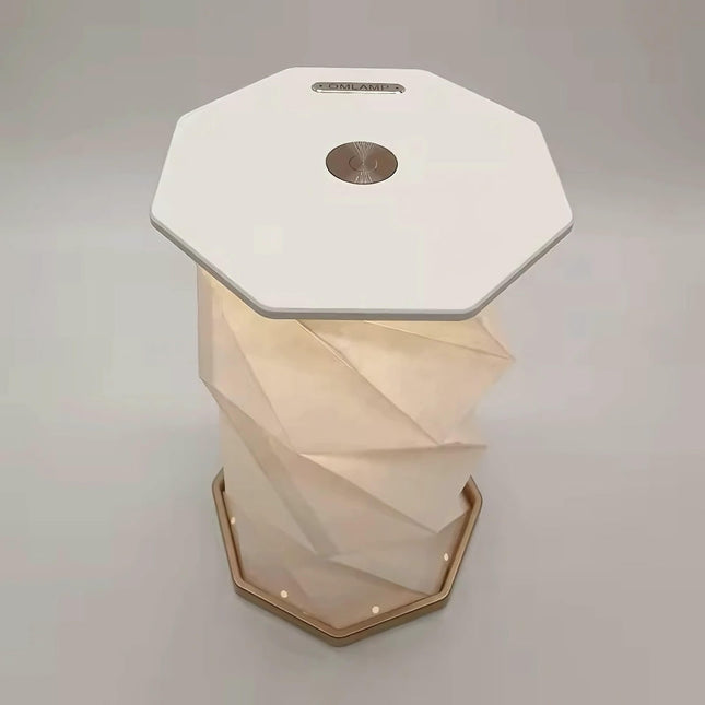 Vikbar LED-lampa med modern origami-design