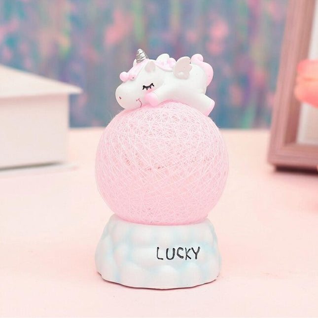 Nattlampa enhörning på rosa lysande boll