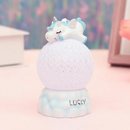 Nattlampa enhörning på rosa lysande boll