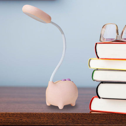 Rosa skrivbordslampa med dinosaurie för barn