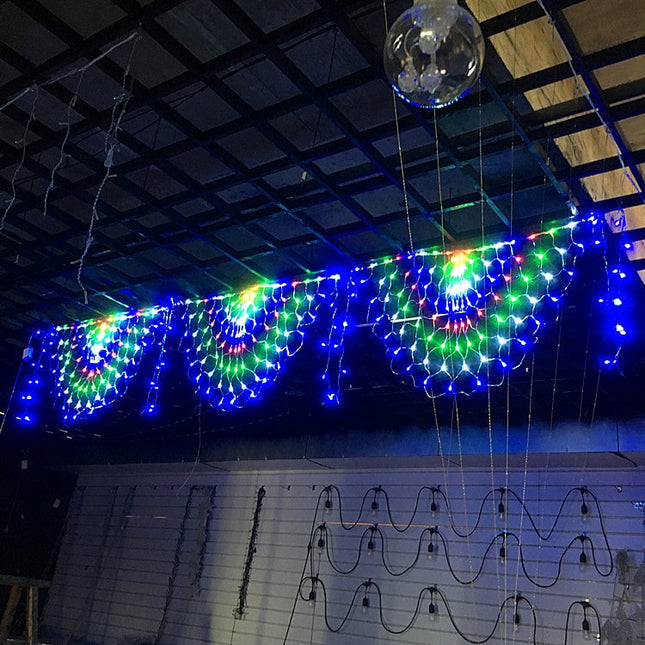 Ljusslinga nät med påfågel design