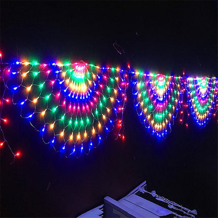 Ljusslinga nät med påfågel design