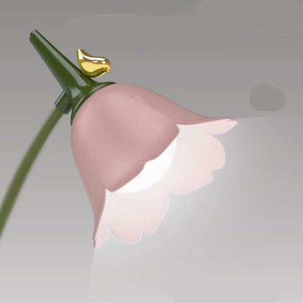 Blomformad skrivbordslampa med justerbar arm