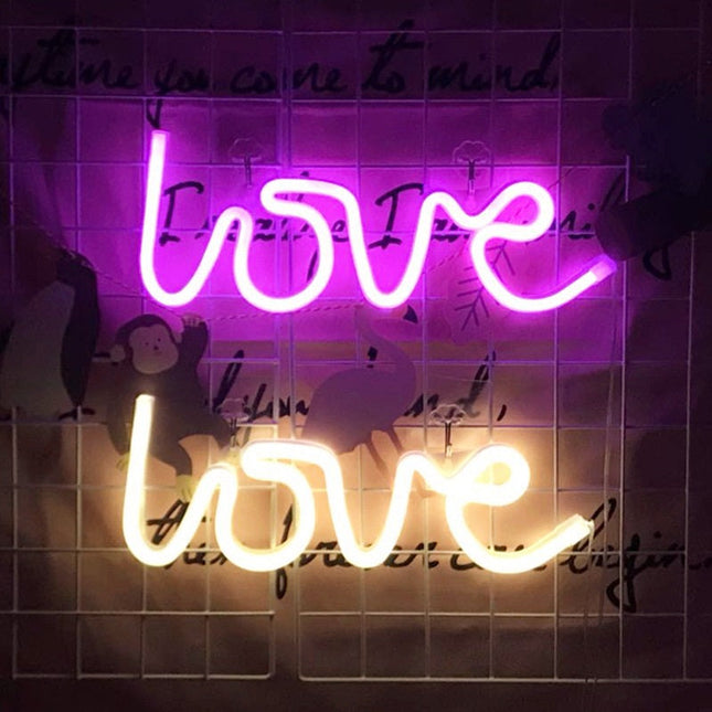 Neonlampa med texten 'Love' för vägg