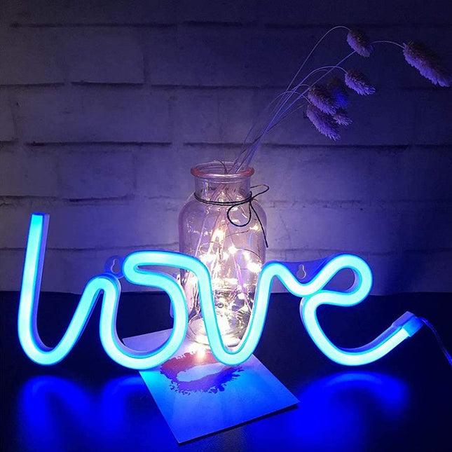 Neonlampa med texten 'Love' för vägg