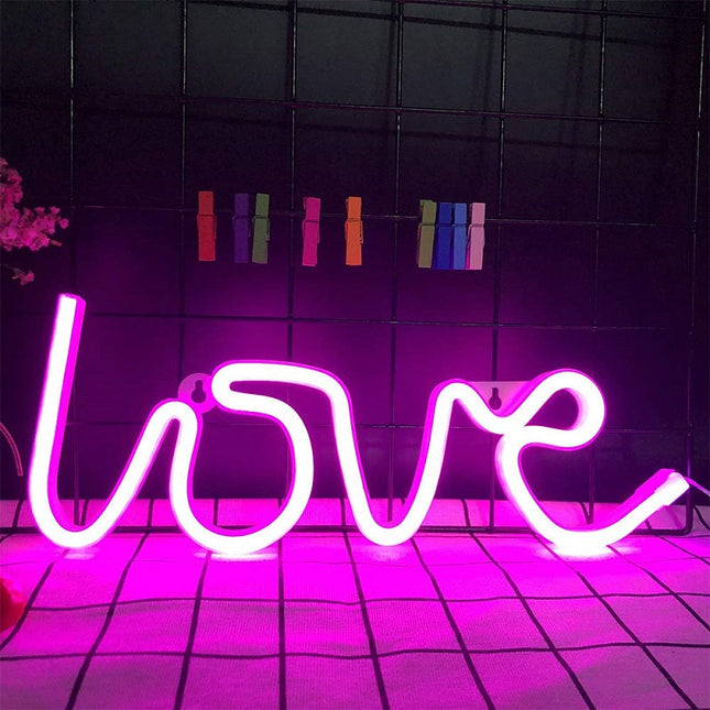 Neonlampa med texten 'Love' för vägg