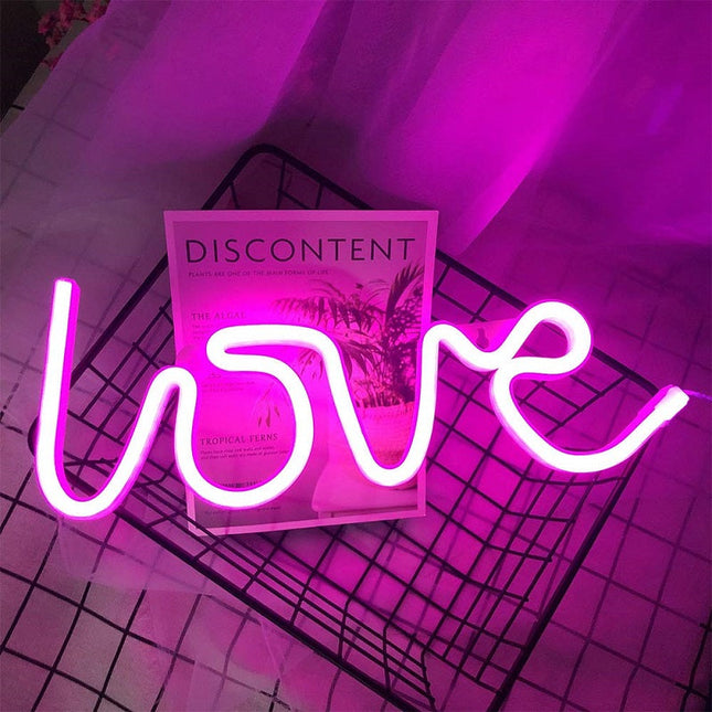 Neonlampa med texten 'Love' för vägg