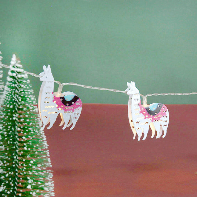 Dekorativ ljusslinga med söta lamor