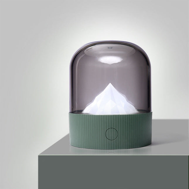 Dekorativ nattlampa med lysande berg