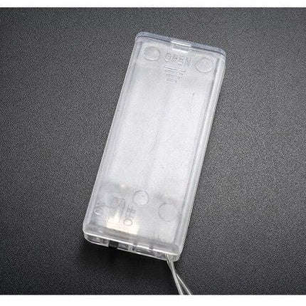 Gul ljusslinga med lysande stjärnor