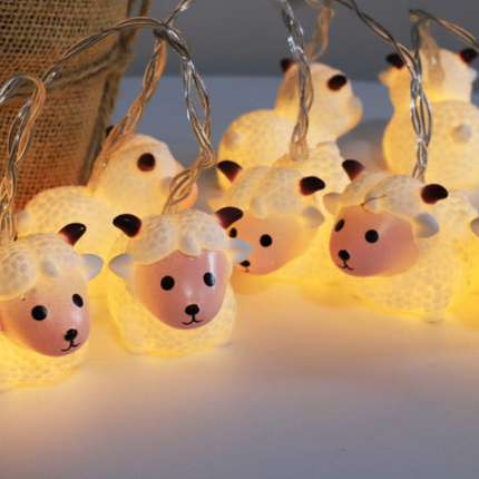 Ljusslinga med små får för barnrum