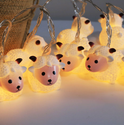 Ljusslinga med små får för barnrum