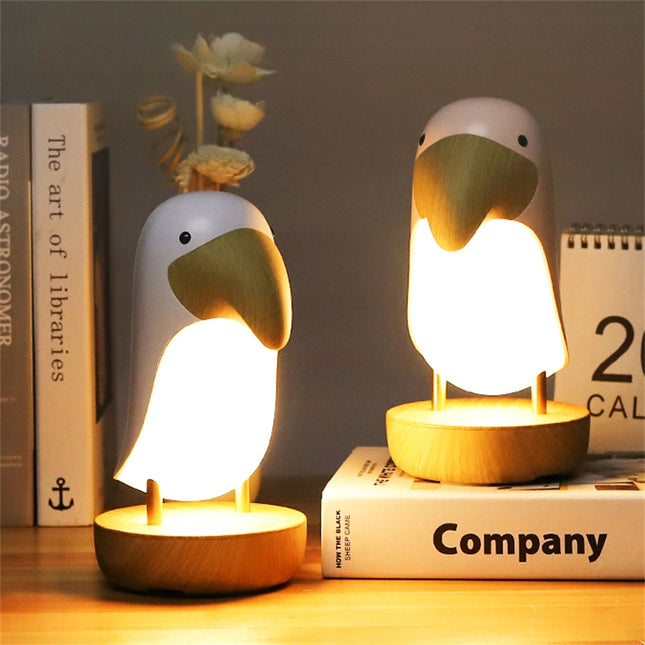 Bordslampa tukan i trä med ljus