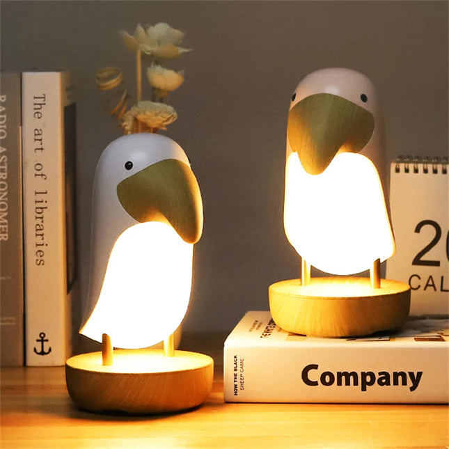 Bordslampa tukan i trä med ljus